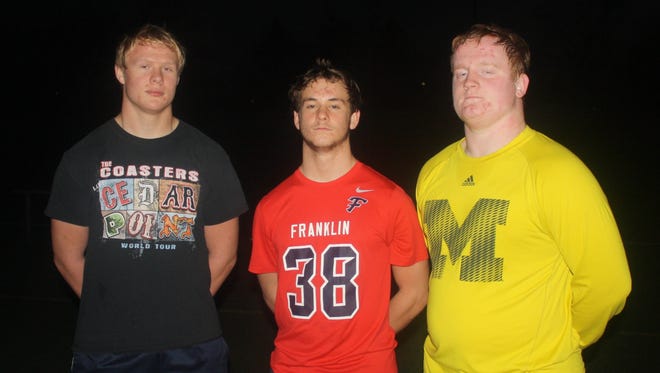 Livonia Franklin football captains (from left) Josh Retting, Chris Nehasil and Ryan Tracy have all played instrumental roles in the Patriots’ remarkable season, as has fourth captain Rob Erwin, who was attending his brother’s police academy graduation ceremony.