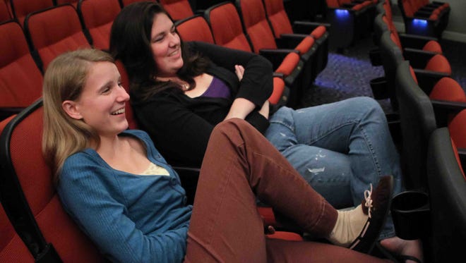 Bethany Wolstenholme (left) and Deborah Holcombe watch a Philadelphia Eagles game at Theatre N in 2011.