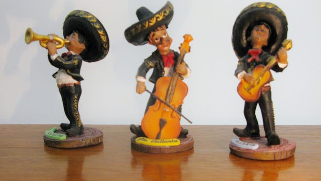 Mariachi figurines bought at a Mexican Flea Market. It is usually necessary to negotiate what you'll pay for your purchases.