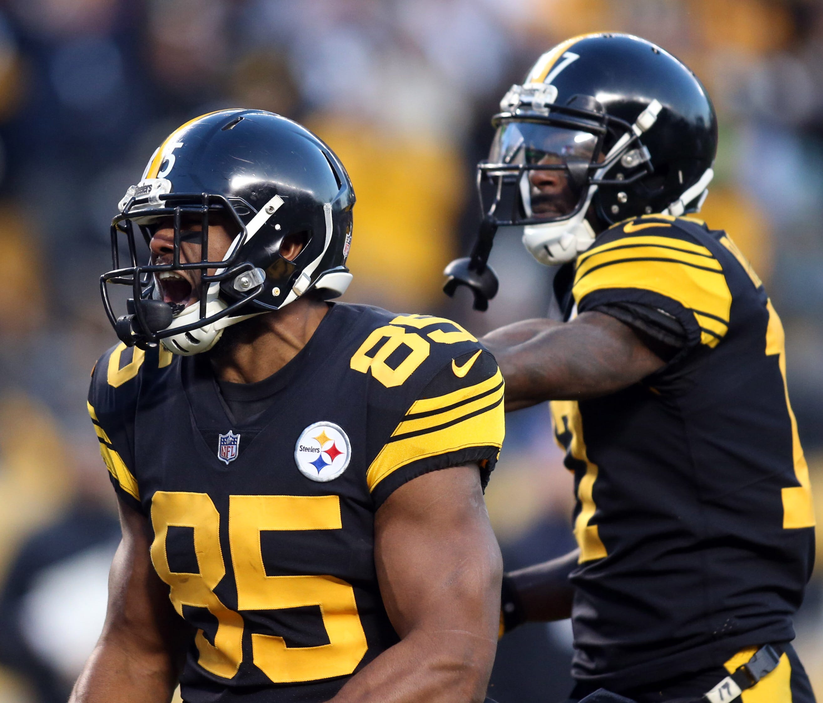 Pittsburgh Steelers tight end Xavier Grimble (85) reacts after scoring a touchdown against the Baltimore Ravens during the first quarter at Heinz Field.