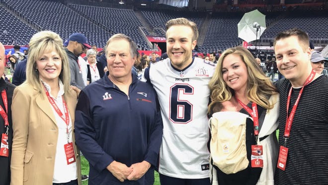 New England Patriots punter Ryan Allen, from West Salem, with his family and head coach Bill Belichick at Super Bowl LI last year.