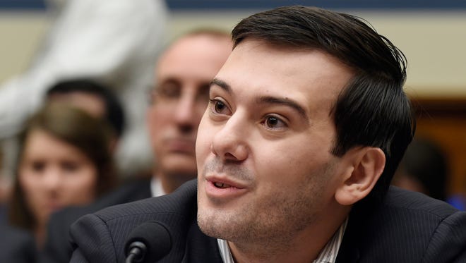 In this Feb. 4, 2016 photo, pharmaceutical chief Martin Shkreli speaks on Capitol Hill in Washington during the House Committee on Oversight and Reform Committee hearing on a decision by his former company, Turing Pharmaceuticals, to significantly raise the price of the anti-parasitic medication Daraprim. Heated protests at the University of California, Davis brought the cancellation of planned speeches by far-right commentator Milo Yiannopoulos and former pharmaceutical executive Shkreli shortly before the event was to begin. University police put up barricades as protesters shouting "shut it down" grew increasingly rowdy in the hours leading up to the talks on Friday night, Jan. 13, 2017.