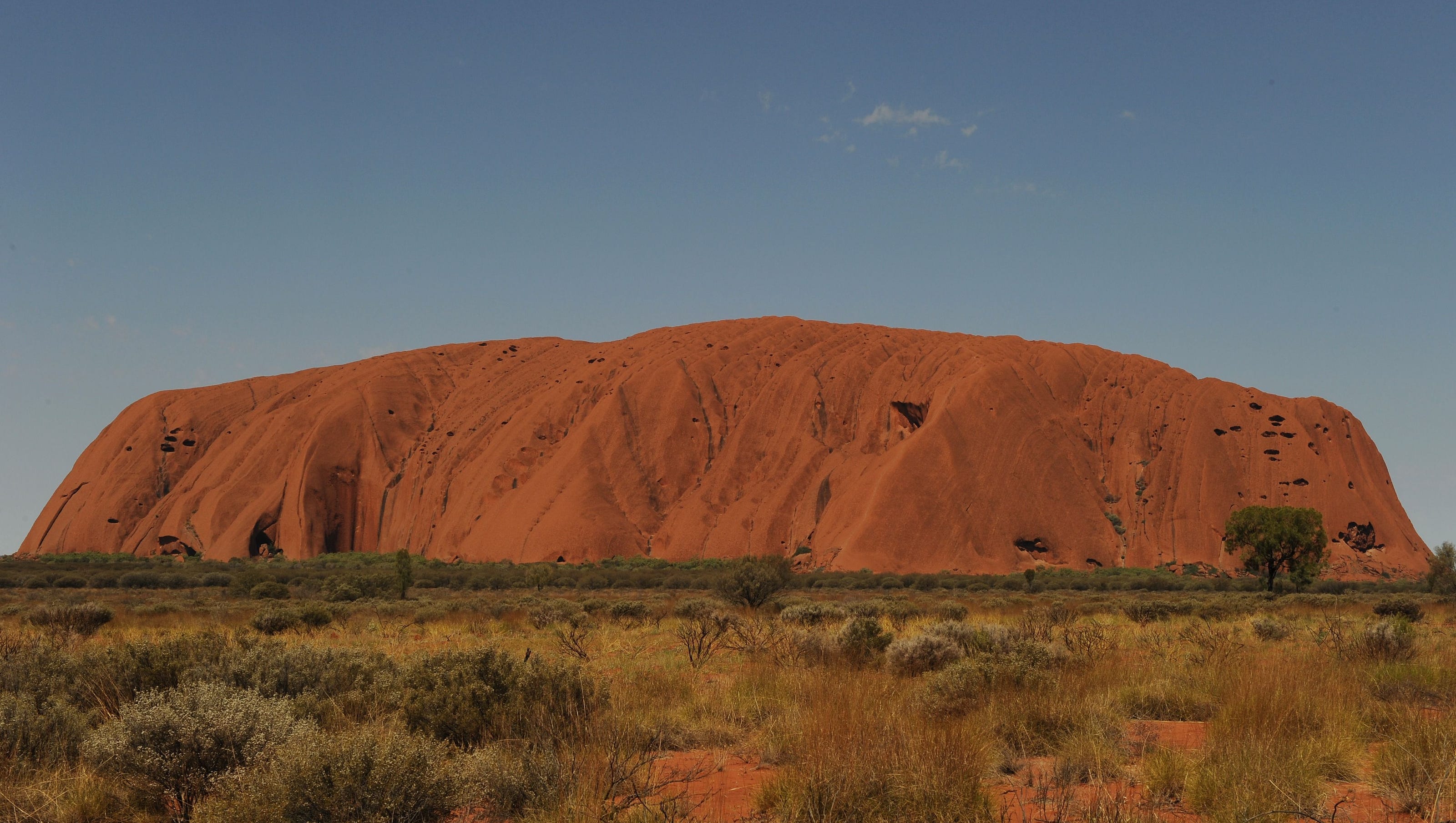 Australia bans tourists from climbing iconic rock Uluru; Not a Disney ride, chairman says