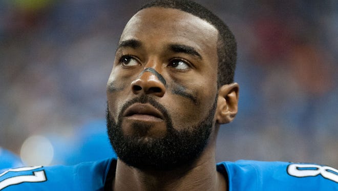 Detroit Lions wide receiver Calvin Johnson  looks on during the third quarter against the Buffalo Bills at Ford Field.