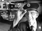 In this photo from 1989, William Chesterman, 84, tips