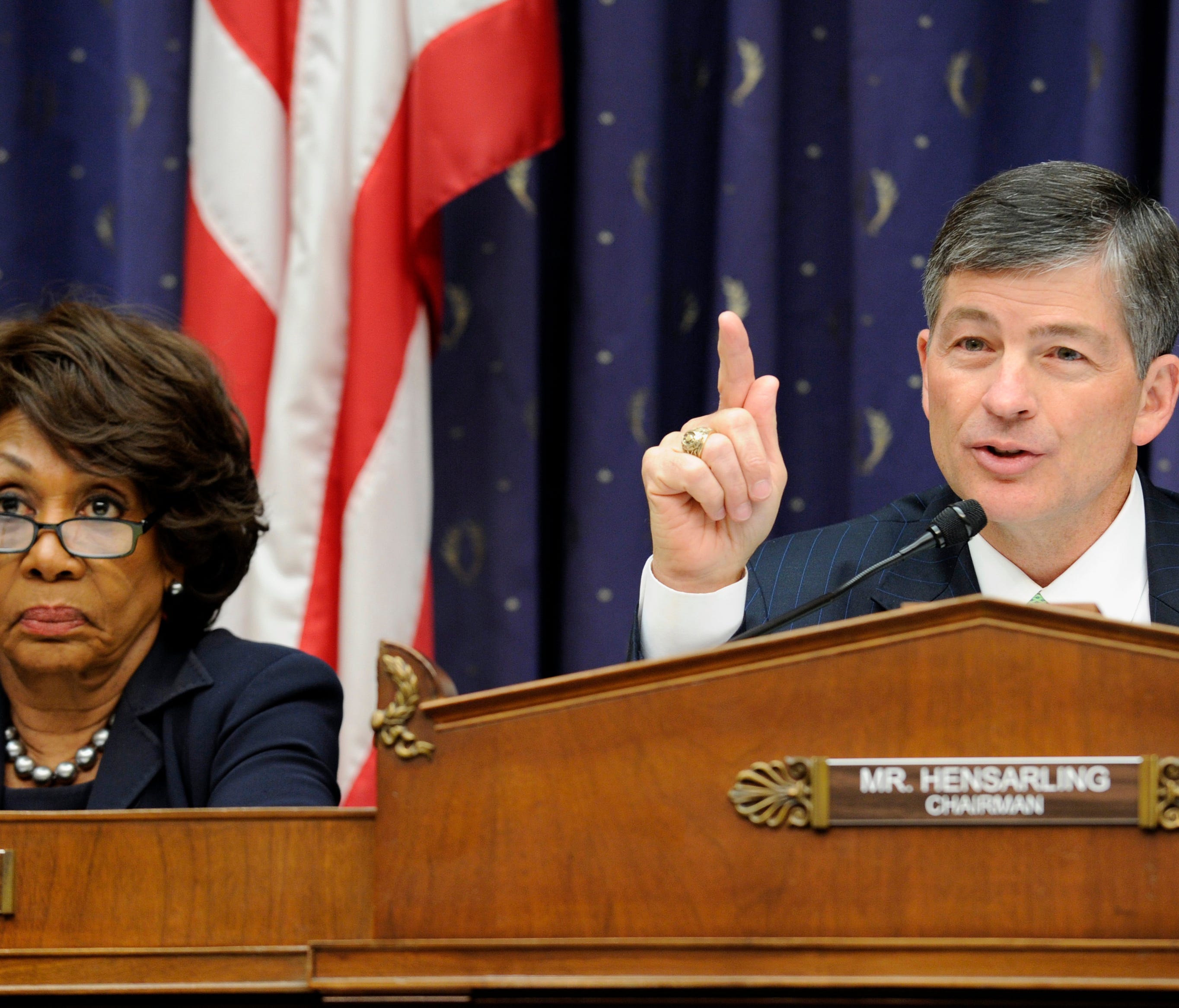 File photo taken in 2014 shows House Financial Services Committee Chairman Rep. Jeb Hensarling, R-Tex., right, and California Rep. Maxine Waters, the panel's ranking Democrat.