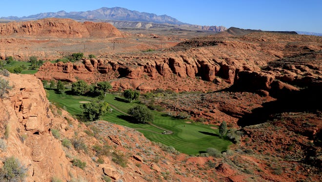 The Dixie Red Hills Golf Club and an historic sandstone quarry (bottom right) are both visible from the Owens Loop Trail in the Red Cliffs Desert Reserve above downtown St. George.
