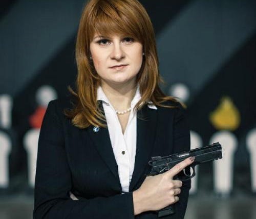 An undated handout picture made available by the Press Service of the Civic Chamber of the Russian Federation on chamber's official website shows  'The Right to Bear Weapons' Public Organization's Board Chairman Maria Butina posing with a gun in Mosc