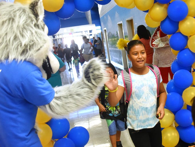 Faculty and staff at Welcome Elementary School greeted