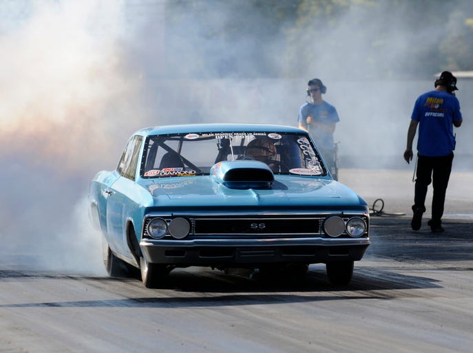 Dave Myers of Belleville performs a burnout in his 1966 Chevrolet Chevelle.