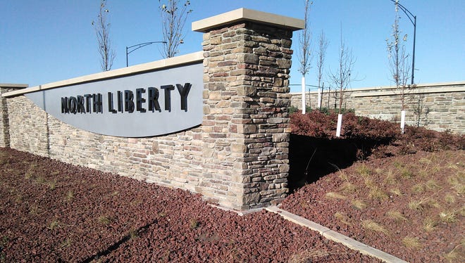 North Liberty’s newest entrance sign anchors the new roundabout at the intersection of Dubuque Street and North Liberty Road.