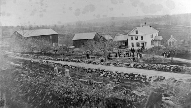 Luther Witt farm west of Plymouth, section 21, with its stone fence lining the road with the freshly deforested farm field. This area is today on Western Avenue, east of Woodlawn Cemetery.