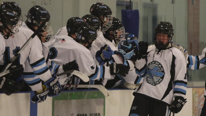 Forward Kevin Johnston (right) scored two second-period goals to help Mahwah defeat Kinnelon, 7-1, in the first round of the Public B state hockey tournament on Monday.