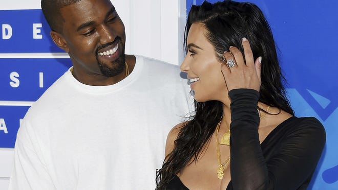 Kanye West and Kim Kardashian West arrive at the MTV Video Music Awards in August. Early Monday, armed robbers forced their way into a private Paris residence where Kim Kardashian West was staying and stole a jewelry box containing valuables worth $6.7 million as well as a ring worth $4.5 million.