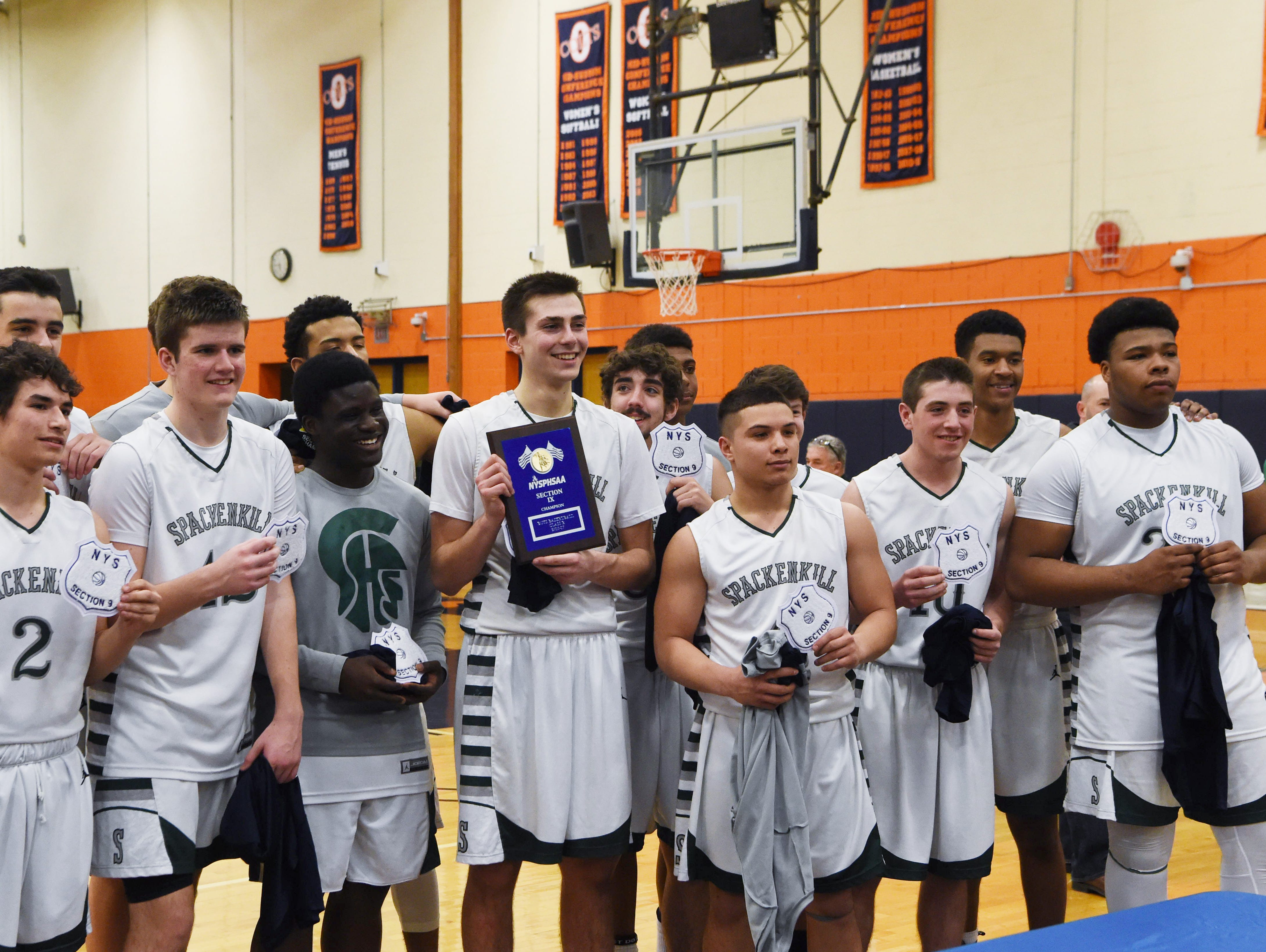 The Spackenkill boys basketball team after beating Rhinebeck in the Section 9 Class B championship game at SUNY Orange in Middletown.