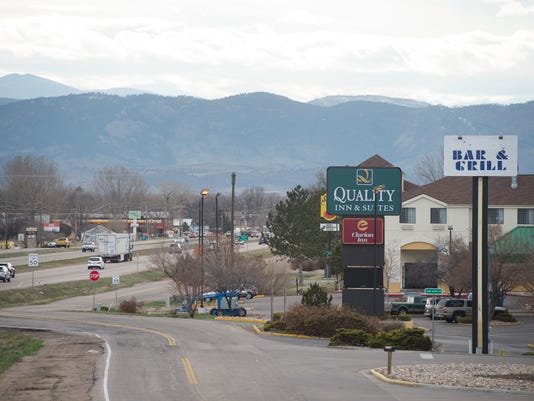 Larimer County tables decision on American Furniture Warehouse sign