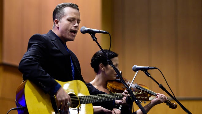 Jason Isbell and Amanda Shires played two sets Tuesday at the Country Music Hall of Fame and Museum for Chicagoans gathered around a video wall at South Michigan Avenue and Congress Parkway.