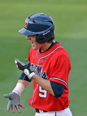 Freshman Kyle Watson celebrates a double in Ole Miss' 9-4 win against William & Mary on Friday.