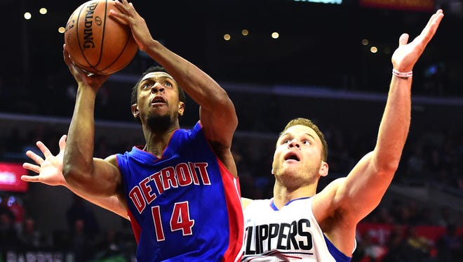 Ish Smith, left, of the Detroit Pistons scores past Blake Griffin of the Los Angeles Clippers during the first half Nov. 7, 2016, in Los Angeles.