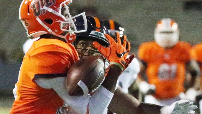 UTEP wide receiver Erik Brown drops a pass in the end zone against UTSA Saturday night in the Sun Bowl.