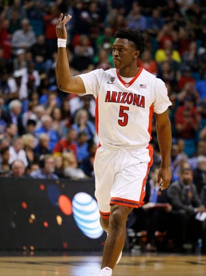 Arizona's Stanley Johnson celebrates after sinking a three-point shot against UCLA on March 13, 2015, in Las Vegas.