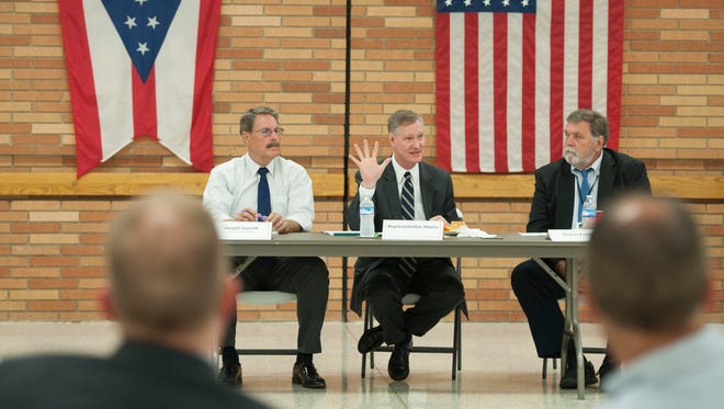 Congressman Steve Stivers, middle, from Ohio’s 15th District, participates in a local roundtable discussion about current issues, including the limited broadband internet access to children with one in five having good quality internet, with local businessmen.