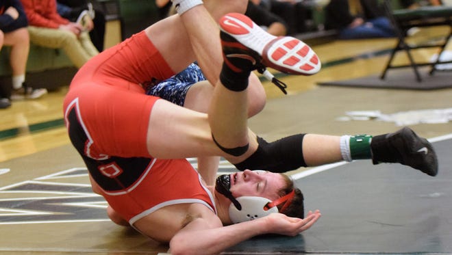 G.W. Shultz, front, gave Riverheads its lone gold medal of the Big Blue Invitational on Saturday at Christiansburg High School. The junior won the 120-pound title to improve to 32-2 on the season.