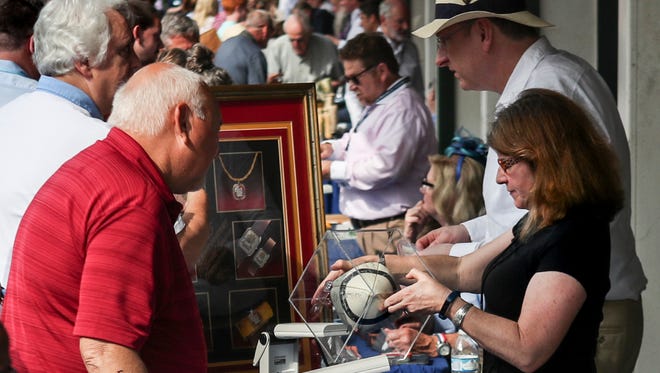 Hundreds of people hoping to have a valuable antique or artwork visited PBS' Antiques Roadshow event in the paddock of Churchill Downs Tuesday morning. May 22, 2018. 