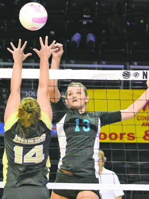 Oñate senior outside hitter Alexis Benda (13) is one of the top players in the state and a leader for the Knights.