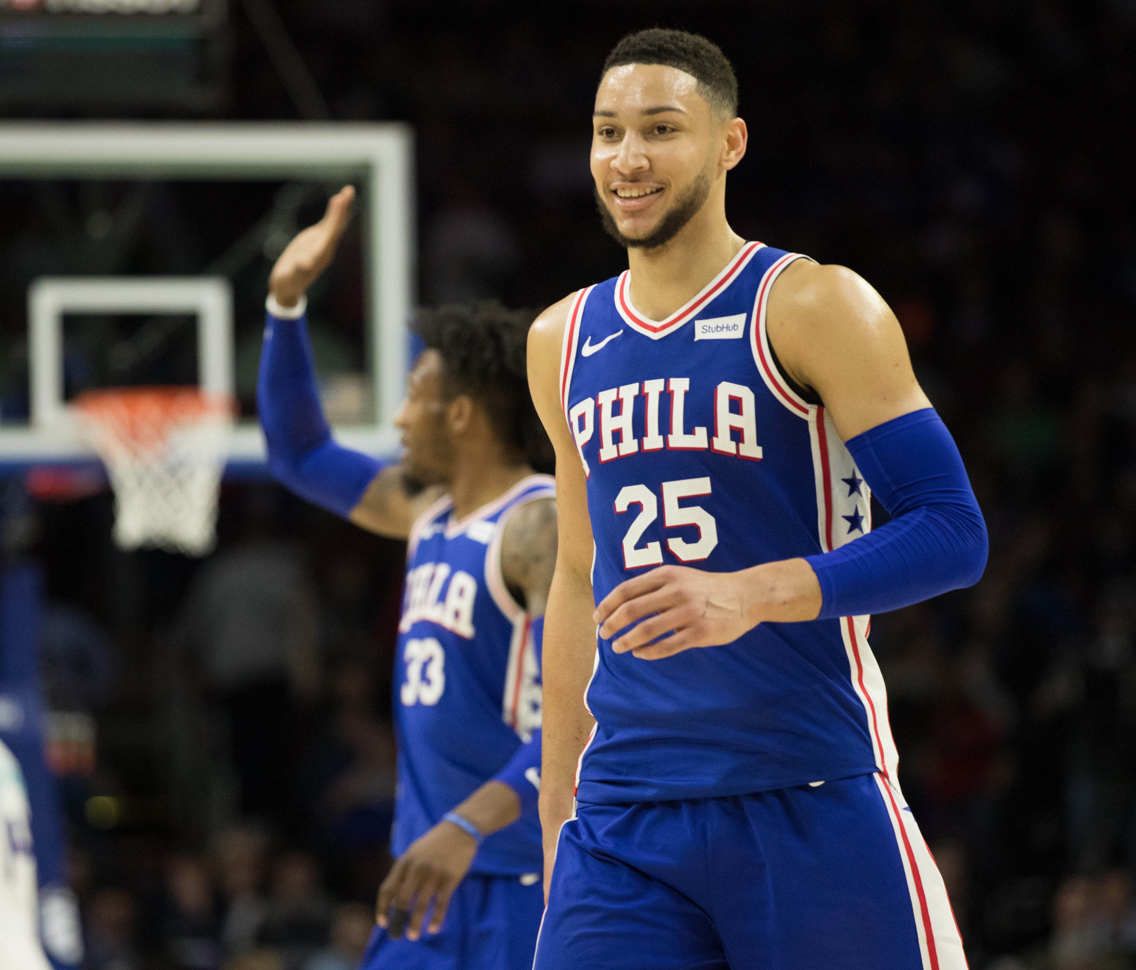 Philadelphia 76ers guard Ben Simmons reacts after recording a triple double during the fourth quarter against the Charlotte Hornets.