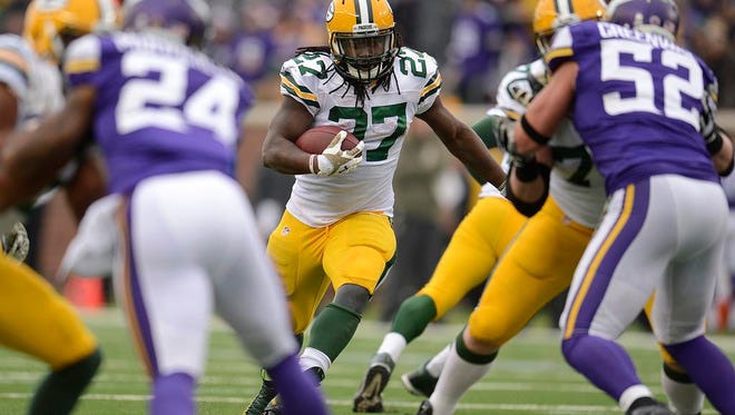 Green Bay Packers running back Eddie Lacy gains yardage against the Minnesota Vikings during Sunday's game at TCF Bank Stadium in Minneapolis.