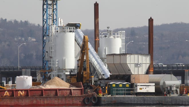 A new concrete plant in operation on a barge near the Rockland construction trestle for the new Tappan Zee Bridge March 16, 2015. Two plants were rebuilt after a silo collapsed on one Dec. 16, 2014.