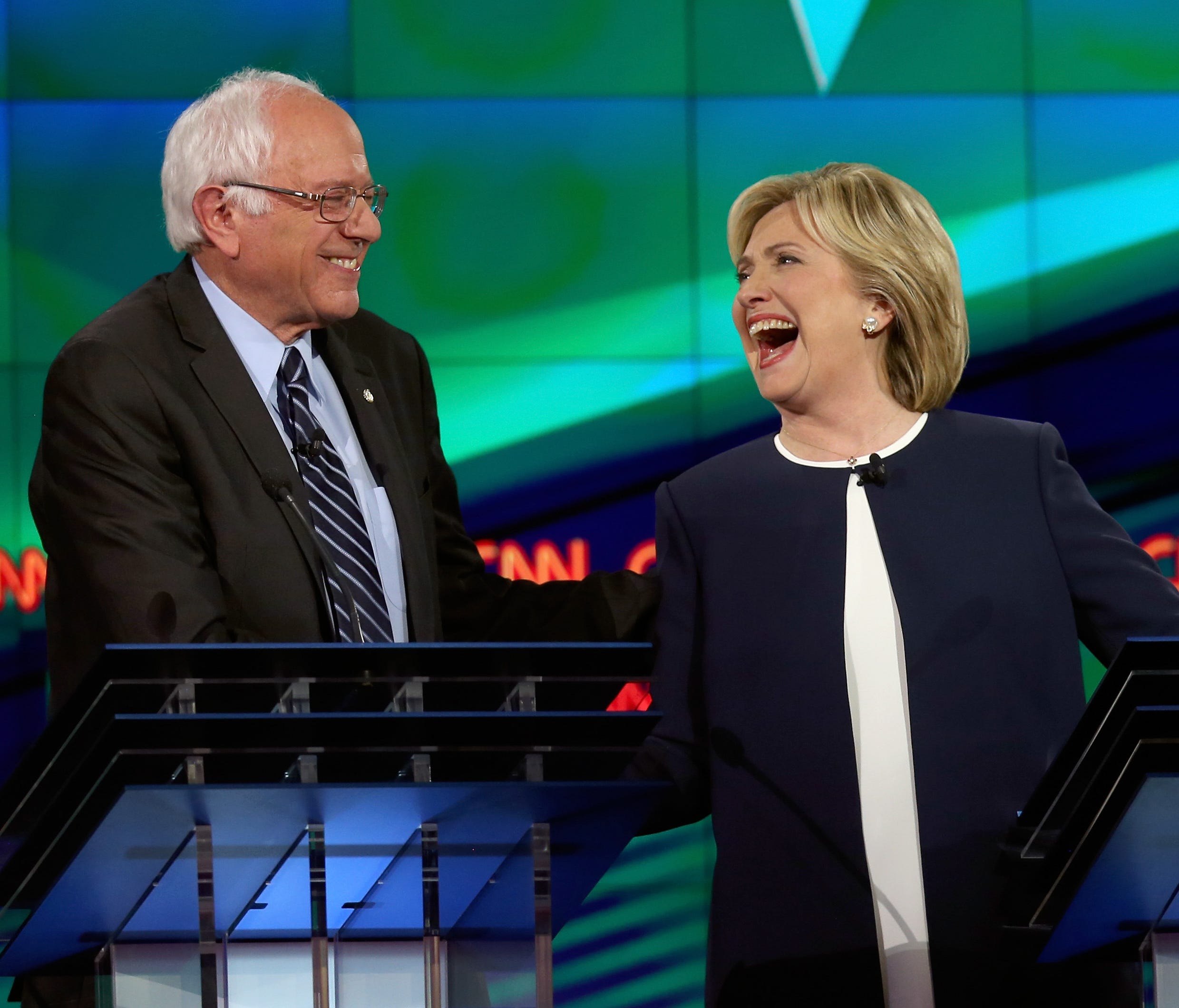 Democratic presidential candidates Sen. Bernie Sanders and Hillary Clinton take part in a presidential debate sponsored by CNN and Facebook at Wynn Las Vegas on Oct. 13, 2015 in Las Vegas, Nev.