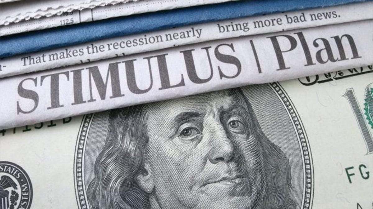 Newspaper headlines about a stimulus plan and a $100 bill.