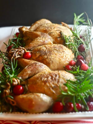 Cornish game hens make and easy, festive Christmas dinner.
