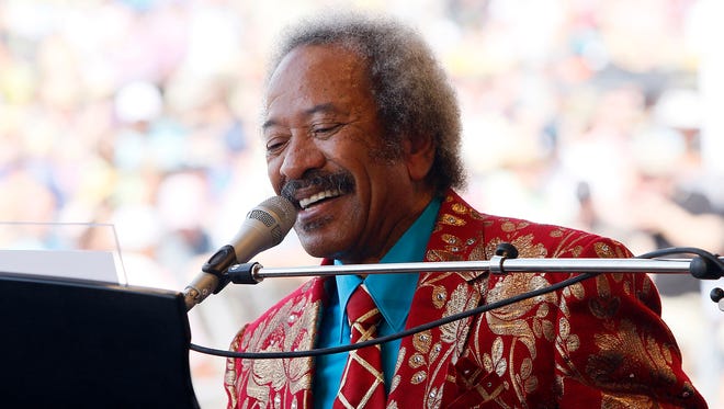 In this file photo dated Saturday, May 7, 2011, Allen Toussaint performs at the†New Orleans Jazz and Heritage Festival in New Orleans. Legendary New Orleans musician Toussaint died after suffering a heart attack after a concert he performed in the Spanish capital, Madrid, after emergency services were called Monday Nov. 9, 2015, to his hotel.