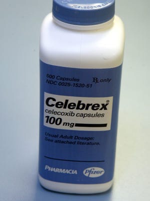 This Thursday, Sept. 30, 2004 photo shows a bottle of Celebrex at a pharmacy in New York. A new study released on Sunday, Nov. 13, 2016 may reassure millions of arthritis sufferers who want pain relief without bad side effects. It found that Celebrex, a drug similar to ones withdrawn 12 years ago for safety reasons, is no riskier for the heart than some other prescription pain pills that are tough on the stomach. (AP Photo/Mary Altaffer, File)