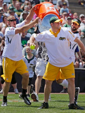 Jordy Nelson, left and Aaron Rodgers dump water on