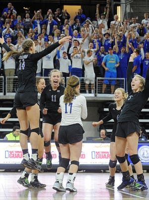 Sioux Falls Christian players react after defeating Mt. Vernon/Plankinton in the South Dakota State High School Class A championship volleyball match Saturday, Nov. 21, 2015, at the Denny Sanford Premier Center in Sioux Falls. 