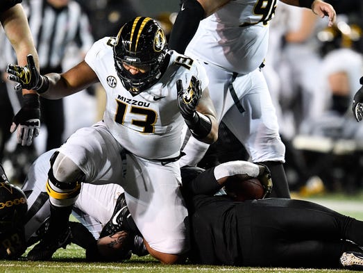 Missouri defensive lineman Rashad Brandon (13) celebrates