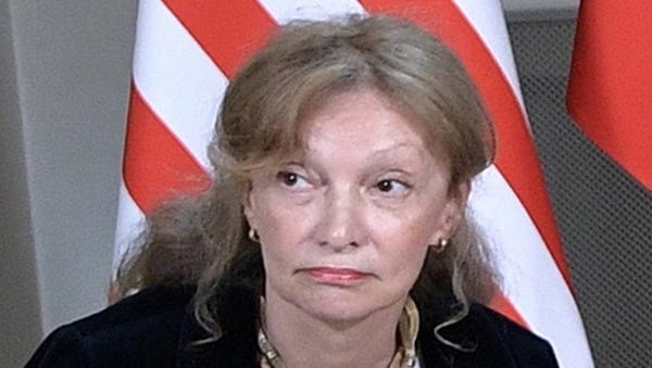 US interpreter Marina Gross looks on during a...