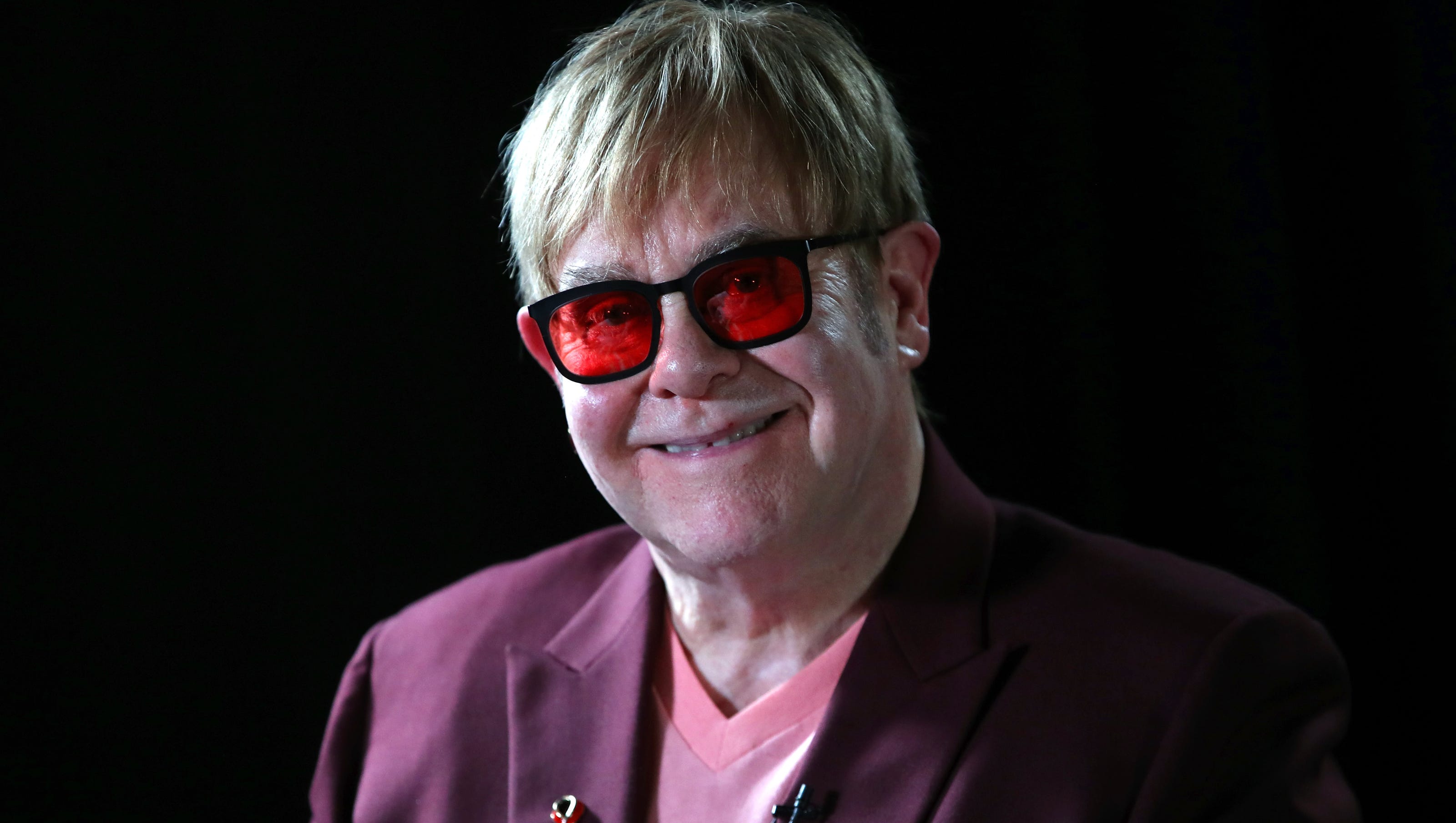 Elton John asks tech world to expand HIV fight at Princess Diana event
