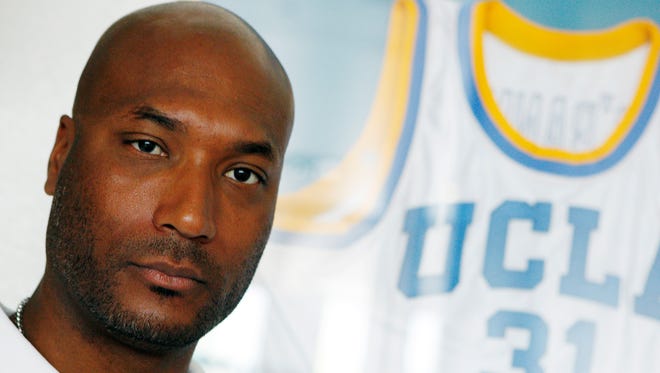 Former UCLA basketball player Ed O'Bannon Jr. sits in his office in Henderson, Nev. in September, 2010.