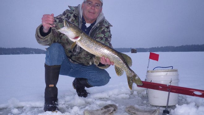 Skip Sommerfeldt with a Northern pike caught in northern Wisconsin in December 2014.