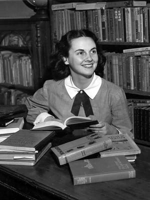 February 15, 1948 - Again turning her back on Hollywood scripts, Barbara Walker, Miss America of 1947, works instead on college textbooks at the Memphis State Library on Feb. 15, 1948. Barbara's latest rejection slip went to David O. Selznick, who asked her to discuss a contract with him in New York. Miss Walker replied that she was "simply not interested." The Memphis beauty plans to teach after graduating in the spring.