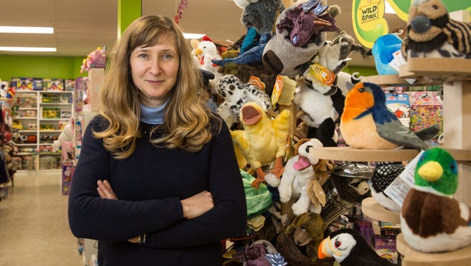 World of Toys owner Olga Kozhevnikova poses for a photo at her Berlin store on Thursday, March 15, 2018.