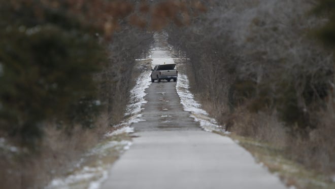 A silver pickup truck was abandoned on the Frisco Highline Trail near Willard.