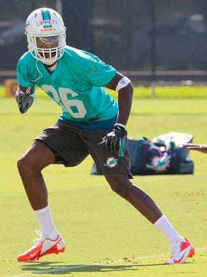 Miami Dolphins cornerback Tony Lippett  works through drills during a rookie minicamp May 8, 2015, in Davie, Fla.