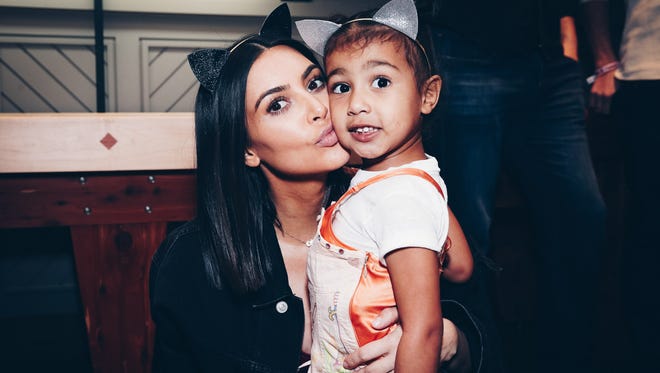Kim Kardashian and Kayne West's daughter, North West. They also share children Saint and Chicago.