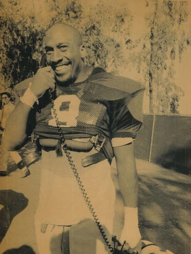 Iowa's Leroy Smith talks to a recruit from his hometown